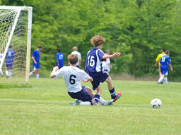 Kids playing soccer