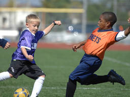 Children enjoy soccer, one of the world's favorite ball sport.