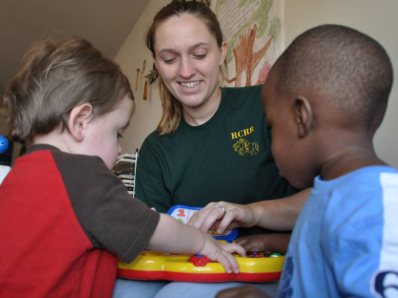 A child's mental development is encouraged in child care centres, where they learn basic skills such as shape recognition.