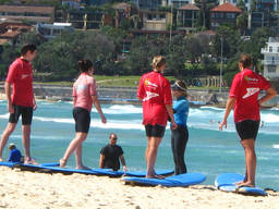 Father and daughter surf lesson.