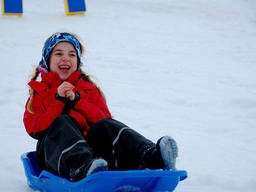 Sleighing is the most basic snow sport that kids can learn.