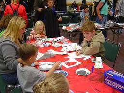 Kids in an arts and crafts workshop.