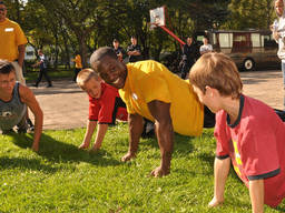 Kids having fun doing calisthenics activities