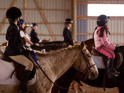 A group of girls prepared to take on the gymkhana challenge