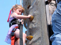 Little girls's first rock climbing experience