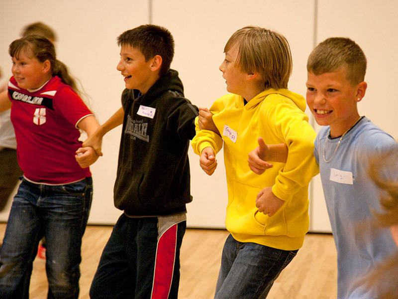 Kids having an exercise before drama class