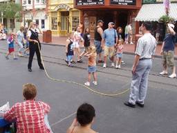 Young girl learning how to jump rope