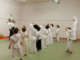 Kids warming up for their first aikido school day