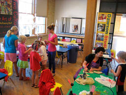Kids enjoy a group art activity.