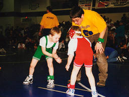 Two boys get ready for a wrestling match