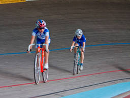 Young track cyclists compete in a veladrome