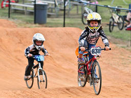 Young BMXers during a race