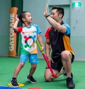 Coach Alex and one of our students.