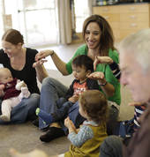 Mums, Dads, Grandparents all join in with the music and movement