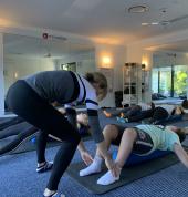 Students working on the Foam Rollers to Improve Posture and Balance