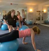 Students working with FitBalls for Fun, Strength and Stability