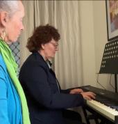 Tara and adult piano student
