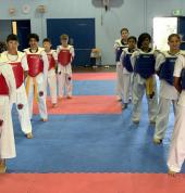 SGMAA Juniors learning the basics of Olympic Taekwondo Sparring
