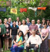 Some of our friendly members under the Dhammachakra flags in our garden