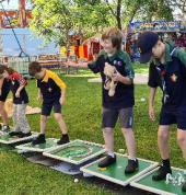 rock and Roll golf with a guest from NSW Lone Scouts (Joey) at the Jacaranda festival childrens morning