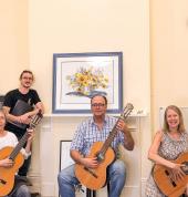 Guitar lessons and ensemble classes for adults.