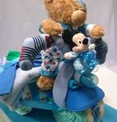 33 x Nappies Crawlers - 1 x Singlet Size 1 –   1 Pair of Socks - 1 Wrap – 1 Bottle – 1 Baby Suit Size 6-12mths – 1 Bib - 1 x Suit Size 1   1 Teddy