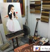 Beautiful girl portrait on easel