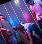 Group completing an immersive laser challenge at Power Play Sydney indoor games venue