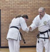 Master Troy Presenting Fist dan Black Belt