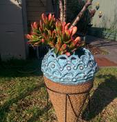 Hanging ceramic planter.