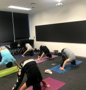 Staff Doing Corporate Yoga
