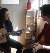 Harry Edwards teaching guitar from the Guitar lessons Hobart studio