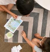 two children playing music games