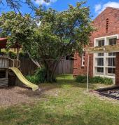 Fabulous outdoor play area with tree cover