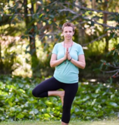 Traditional yoga poses are taught and enjoyed by students.