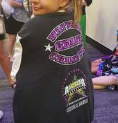 One of our Teen athletes showing off her Grand Champion jacket!