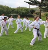 Punching drills during the beach/ park training session