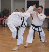 Black Belts sparring during an Exam.