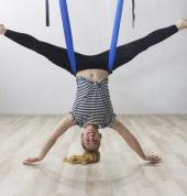 Aerial Yoga boasts numerous health benefits such as increased muscular flexibility, core strengthening, upper and lower body muscular strengthening, increased joint mobility, low impact cardiovascular conditioning, realignment of the spine and because of 