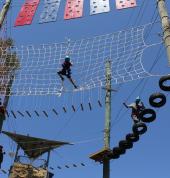 Our thrilling high ropes course and twin flying fox off the rock wall