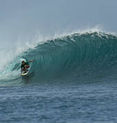 Head instructor, Cory demonstrating excellent tube-riding technique in Bali.