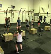 CrossFit Teens completing a WOD