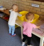 Practical life skills of dish washing.