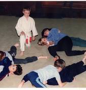 Judo Students workout on the ground without Uniforms