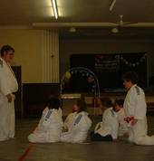 Judo Students sitting listening ready for knowledge