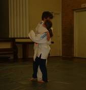 2 Judo Students 1 ready to throw 1 ready to land