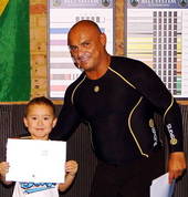Kids earn certificates in Self Defence Classes for achievement.