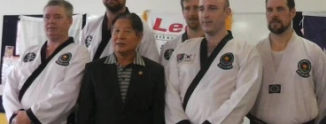 Black belts with Master Lee