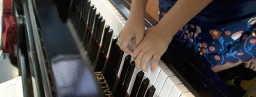 Teach with two baby grand pianos