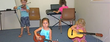 A Music Discovery class for children to learn about many different instruments.
